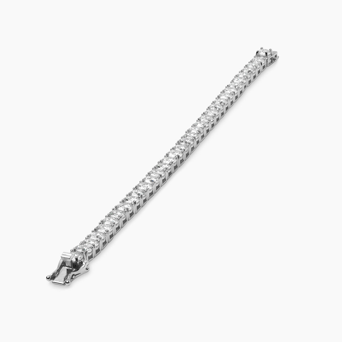 Close-up of men's white gold tennis bracelet with flawless moissanite stones.
