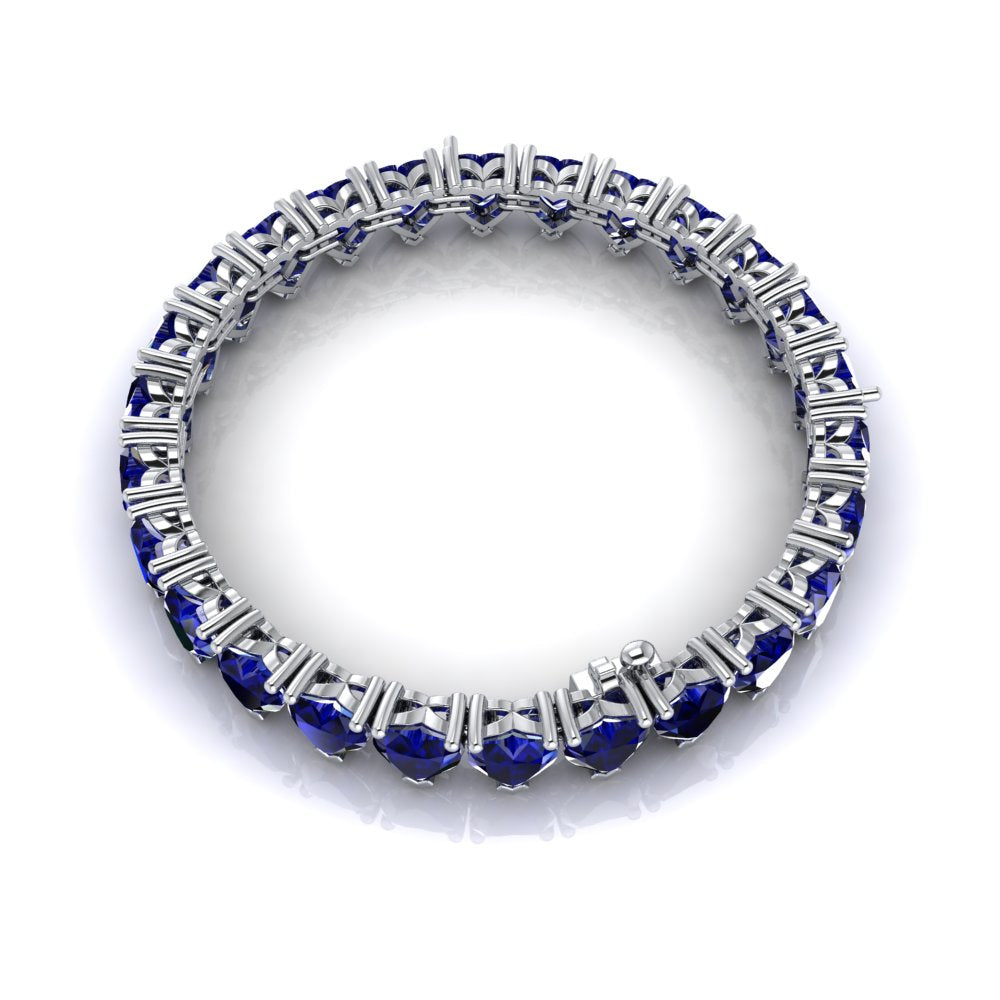 Luxury Amour Blue Sapphire Bracelet - Close-Up of Gemstones in White Gold.