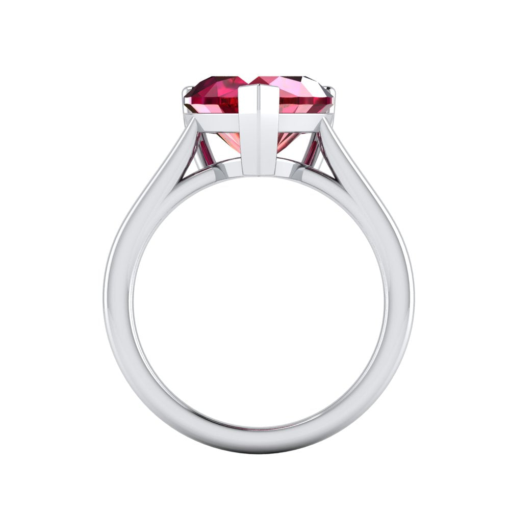 Close-up of heart-shaped ruby on Amour Ruby Heart Ring.